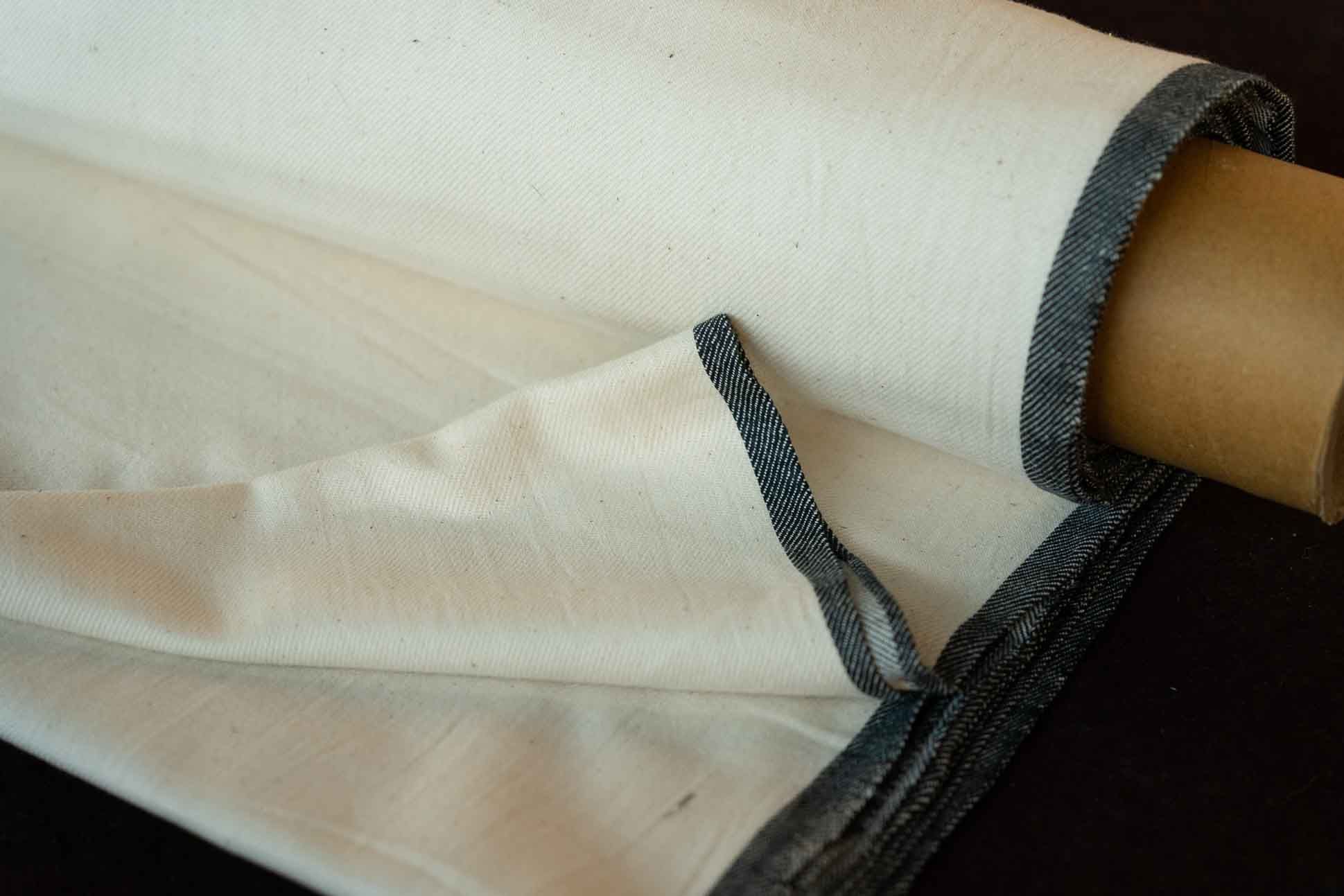 Black Bordered Handloom Khari Cotton Fabric