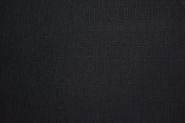 Black Basket Weave Self Design Orange Fiber Fabric