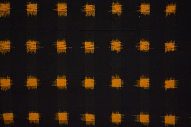 Black And Mustard Double Ikat Cotton Fabric 